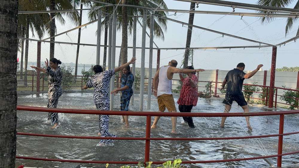 Rain dance activity with lake view at resort
